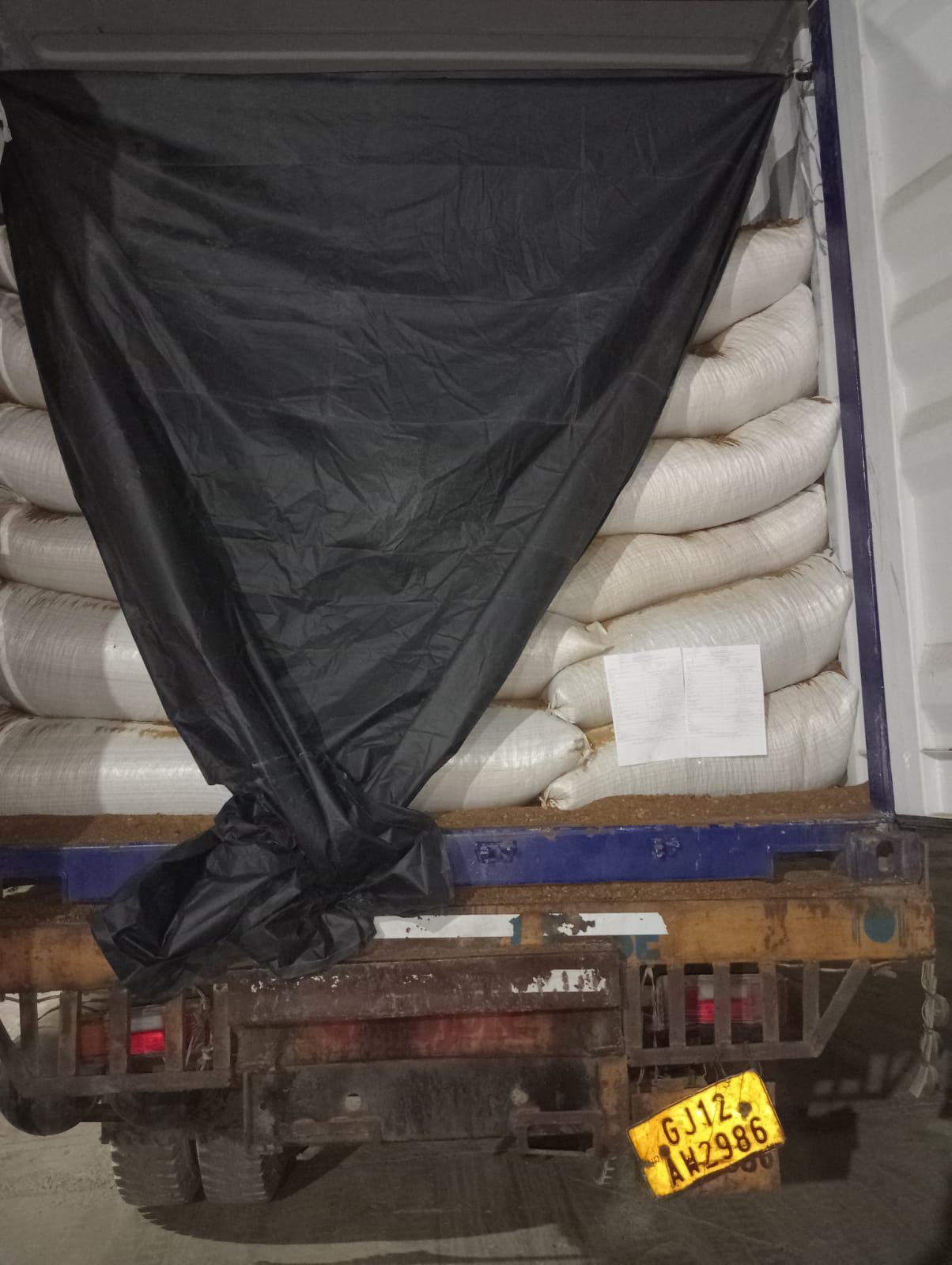 Bagged DOC meal stuffed in container — FCL