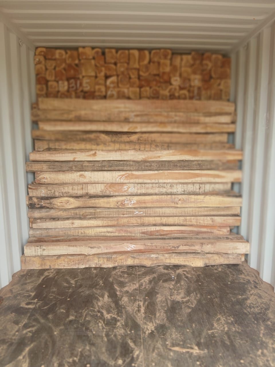 Sawn Ghana teak stacked in container